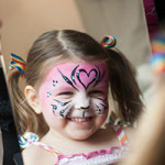 happy girl with heart facepaint