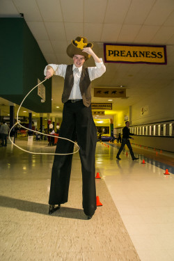 cowboy stilt-walker