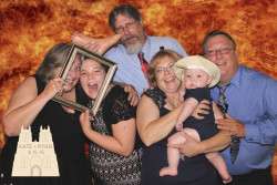 party guests posing for green screen photo
