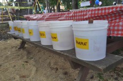 Buckets of dye for Tie-Dye tees