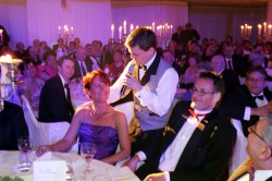 Three charming performers hoax as ‘real’ waiters. Three waiters.