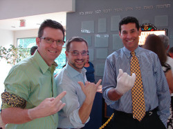party guests wearing their wax hands