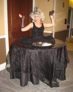living buffet table with 1980s theme and jello shots
