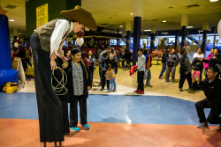 cowboy stilt-walker