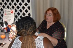 Lipsologist performing a lip reading for party guests