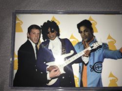 party guests posing on green screen with celebrities
